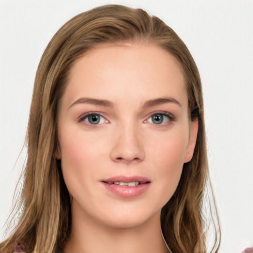 Joyful white young-adult female with long  brown hair and blue eyes