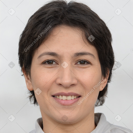 Joyful white adult female with short  brown hair and brown eyes