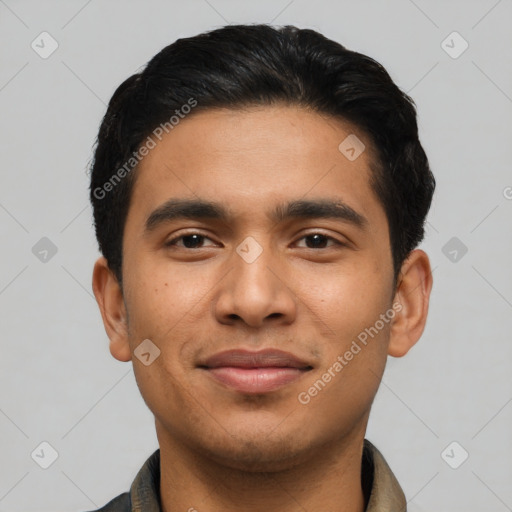 Joyful asian young-adult male with short  black hair and brown eyes