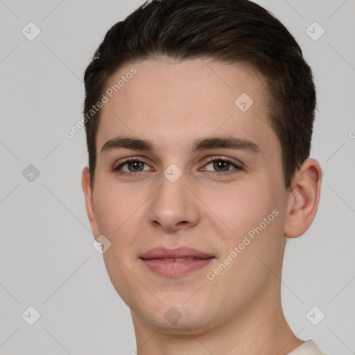 Joyful white young-adult male with short  brown hair and brown eyes