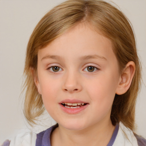 Joyful white child female with medium  brown hair and blue eyes