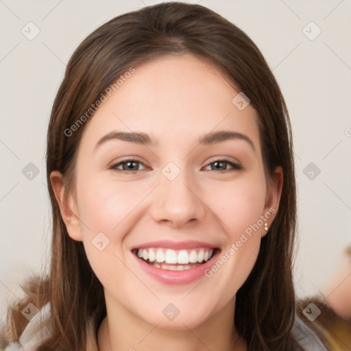 Joyful white young-adult female with long  brown hair and grey eyes