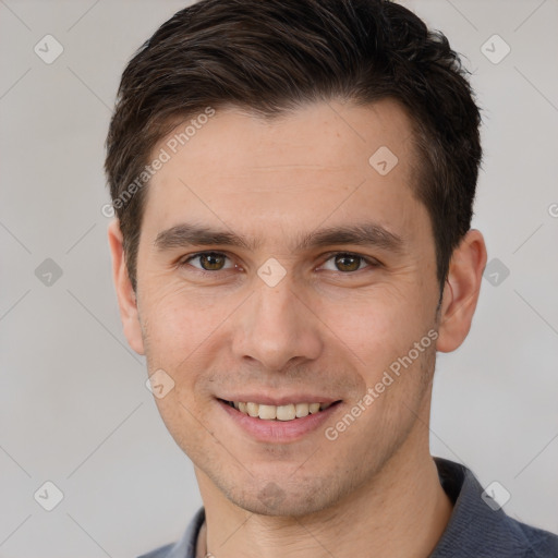 Joyful white young-adult male with short  brown hair and brown eyes