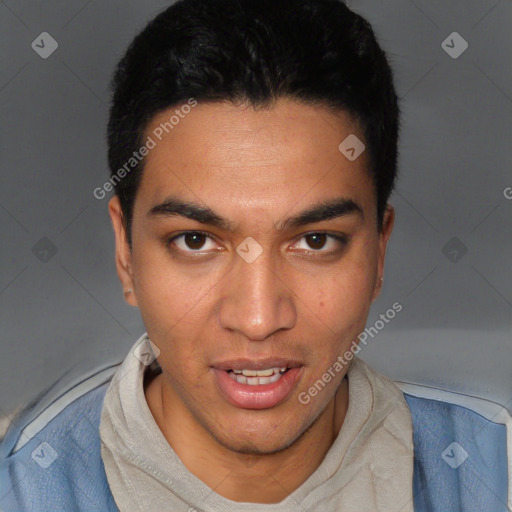 Joyful white young-adult male with short  black hair and brown eyes