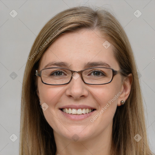 Joyful white young-adult female with long  brown hair and blue eyes