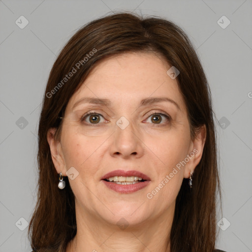 Joyful white adult female with medium  brown hair and grey eyes