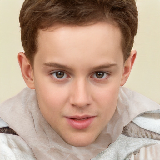 Joyful white child male with short  brown hair and brown eyes