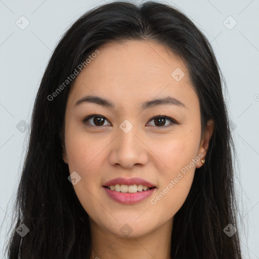 Joyful asian young-adult female with long  brown hair and brown eyes