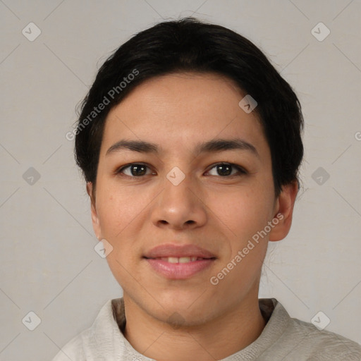 Joyful asian young-adult female with short  black hair and brown eyes