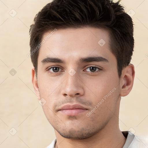 Neutral white young-adult male with short  brown hair and brown eyes