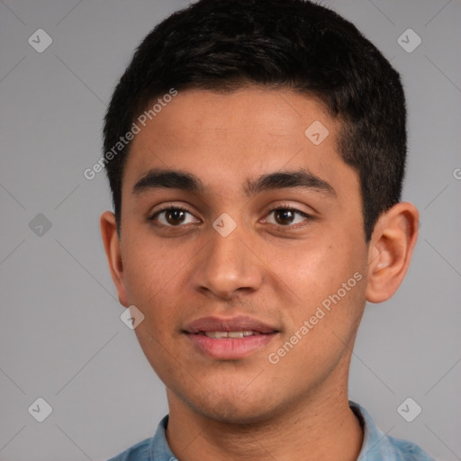 Joyful white young-adult male with short  black hair and brown eyes