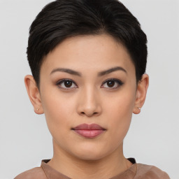 Joyful asian young-adult female with short  brown hair and brown eyes