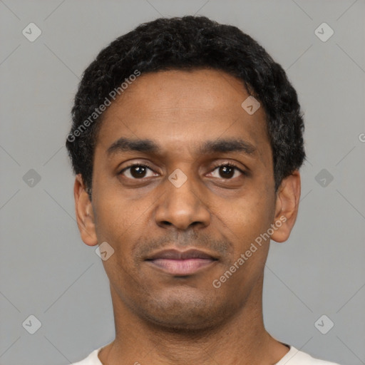 Neutral latino young-adult male with short  black hair and brown eyes