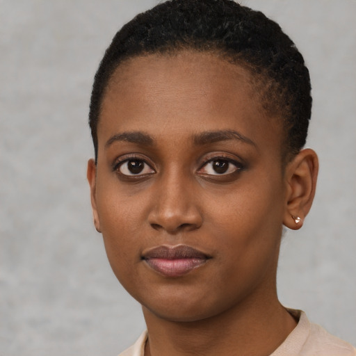 Neutral black young-adult female with short  black hair and brown eyes
