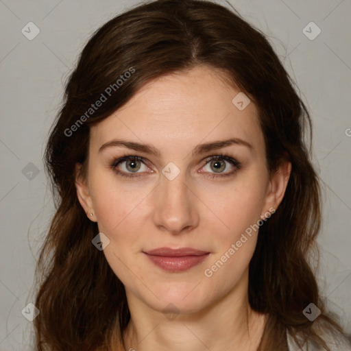 Joyful white young-adult female with medium  brown hair and green eyes