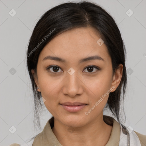 Joyful latino young-adult female with medium  brown hair and brown eyes