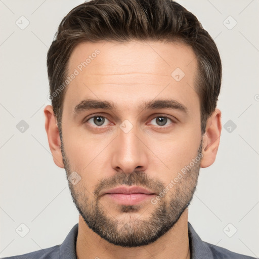 Neutral white young-adult male with short  brown hair and brown eyes