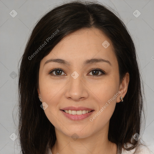 Joyful latino young-adult female with medium  brown hair and brown eyes