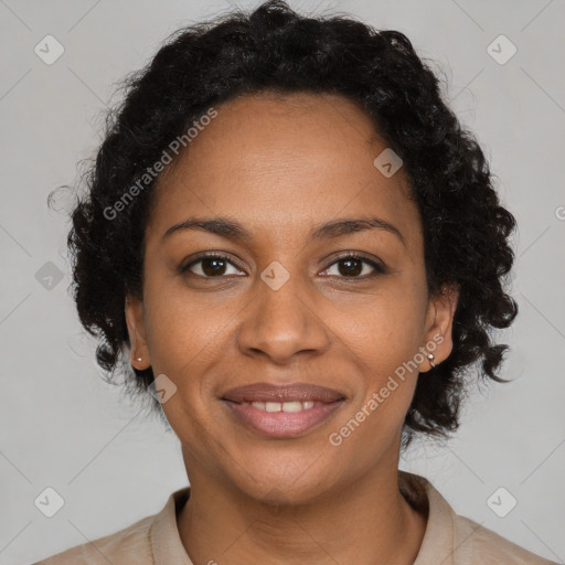 Joyful black young-adult female with medium  brown hair and brown eyes