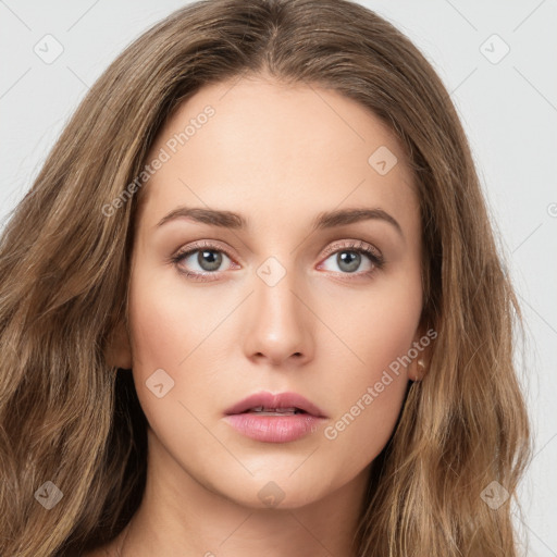 Neutral white young-adult female with long  brown hair and brown eyes