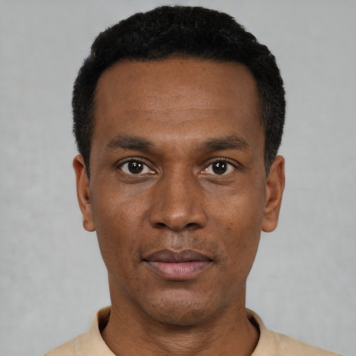 Neutral black young-adult male with short  black hair and brown eyes