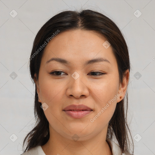 Joyful asian young-adult female with medium  brown hair and brown eyes