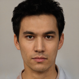 Neutral asian young-adult male with short  black hair and brown eyes