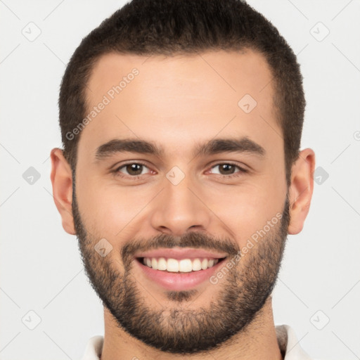 Joyful white young-adult male with short  brown hair and brown eyes