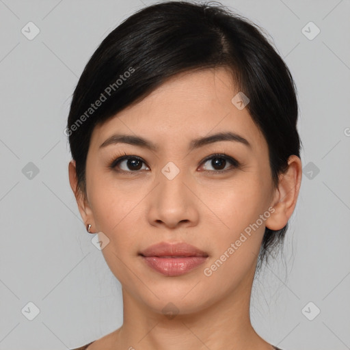 Joyful asian young-adult female with medium  black hair and brown eyes