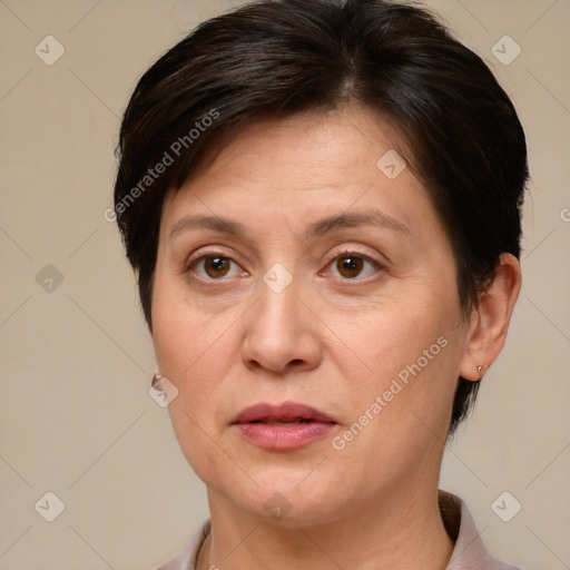 Joyful white adult female with medium  brown hair and brown eyes