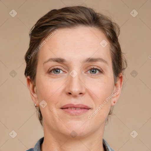 Joyful white adult female with medium  brown hair and grey eyes