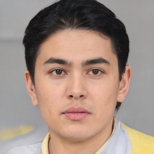 Neutral white young-adult male with short  black hair and brown eyes
