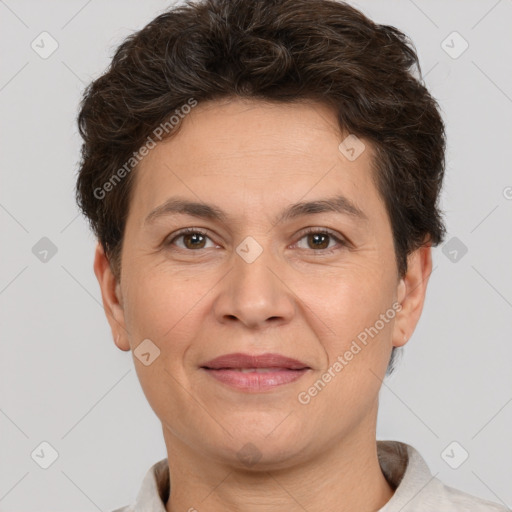 Joyful white adult female with short  brown hair and brown eyes