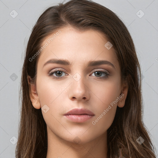 Neutral white young-adult female with long  brown hair and brown eyes