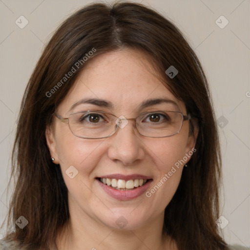 Joyful white adult female with medium  brown hair and grey eyes