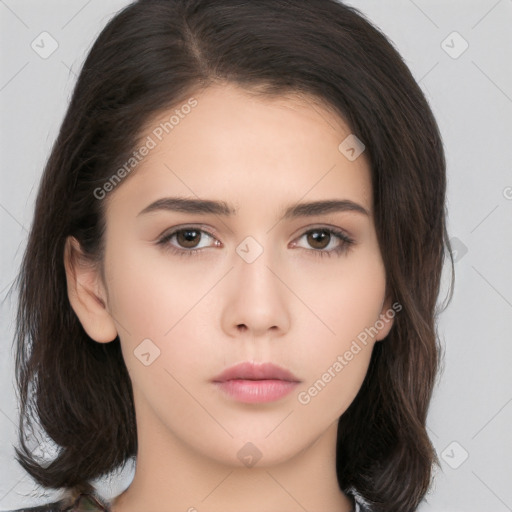 Neutral white young-adult female with long  brown hair and brown eyes