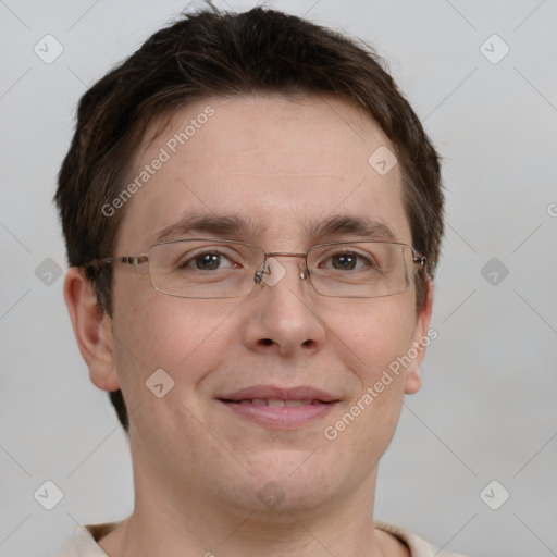 Joyful white adult male with short  brown hair and grey eyes