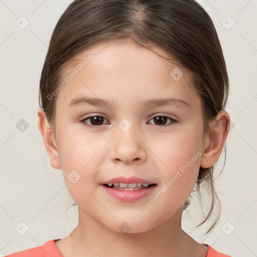 Joyful white child female with medium  brown hair and brown eyes