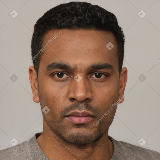 Neutral latino young-adult male with short  black hair and brown eyes