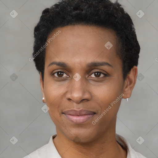 Joyful latino young-adult female with short  black hair and brown eyes