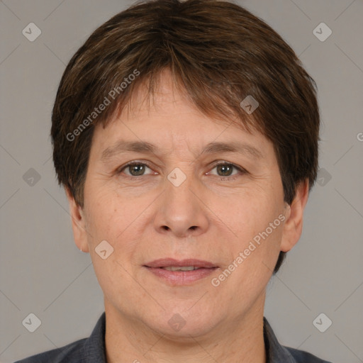 Joyful white adult female with short  brown hair and brown eyes