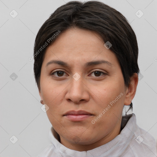 Joyful white adult female with short  brown hair and brown eyes