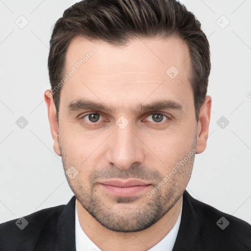 Joyful white young-adult male with short  brown hair and brown eyes