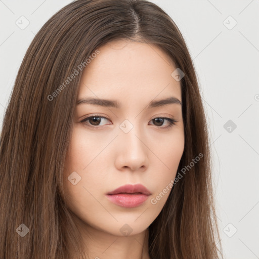 Neutral white young-adult female with long  brown hair and brown eyes