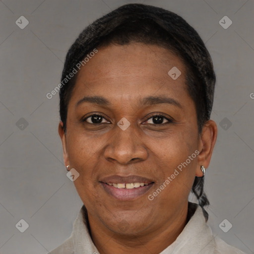Joyful black adult female with short  brown hair and brown eyes