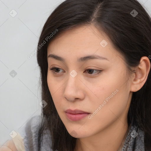 Neutral white young-adult female with long  brown hair and brown eyes