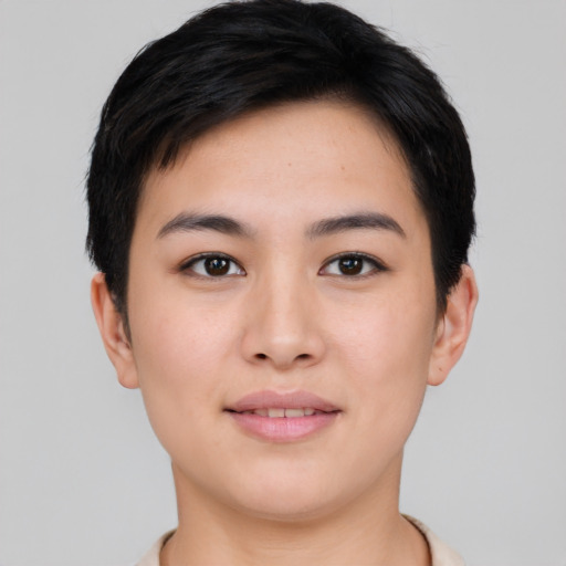 Joyful white young-adult female with short  black hair and brown eyes