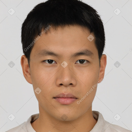 Neutral asian young-adult male with short  brown hair and brown eyes