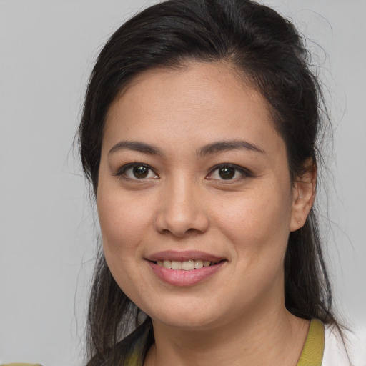 Joyful white young-adult female with medium  brown hair and brown eyes