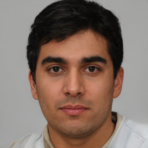Neutral white young-adult male with short  black hair and brown eyes